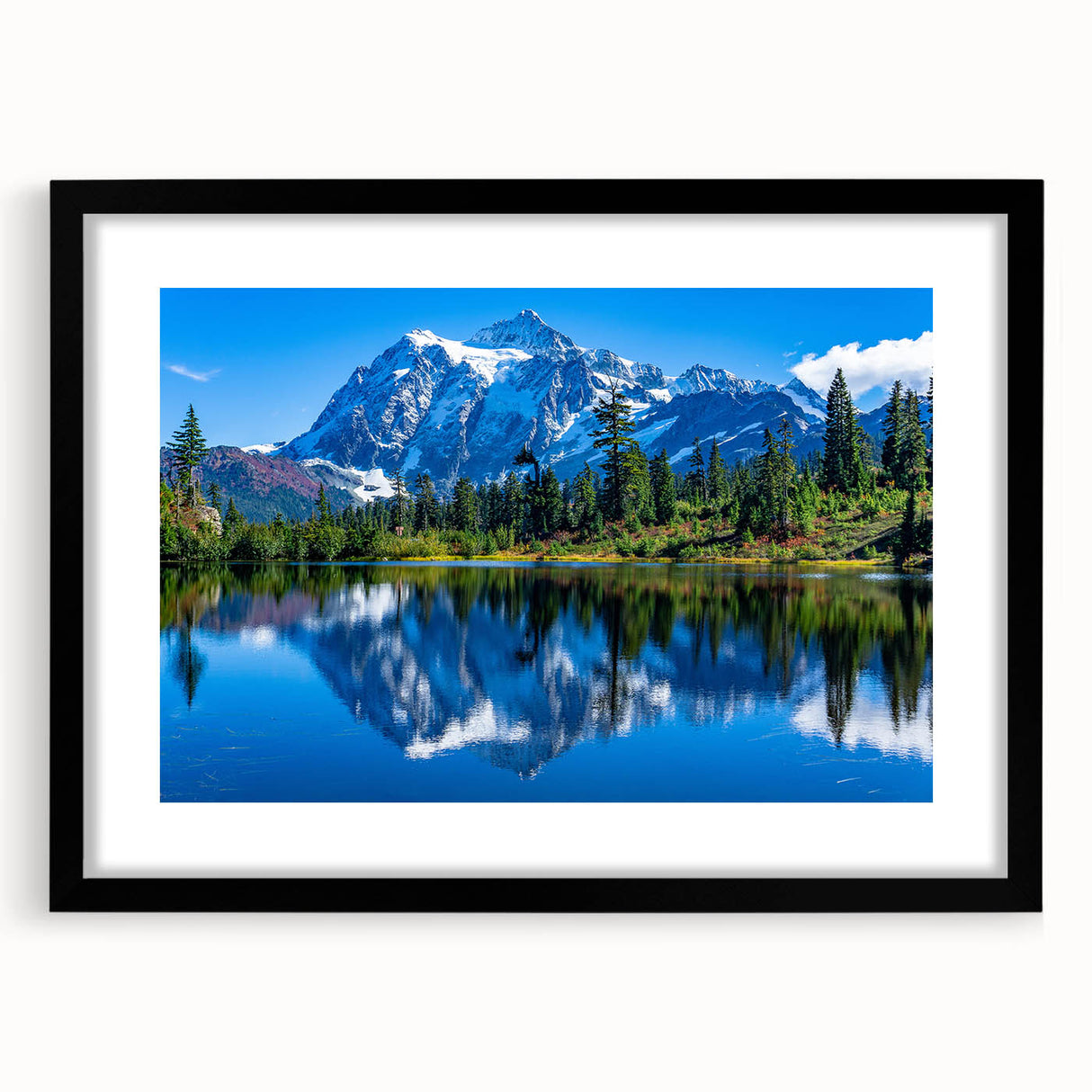 Colorful abstract art print of the Rocky Mountains on a large framed canvas, ideal for living room decor.