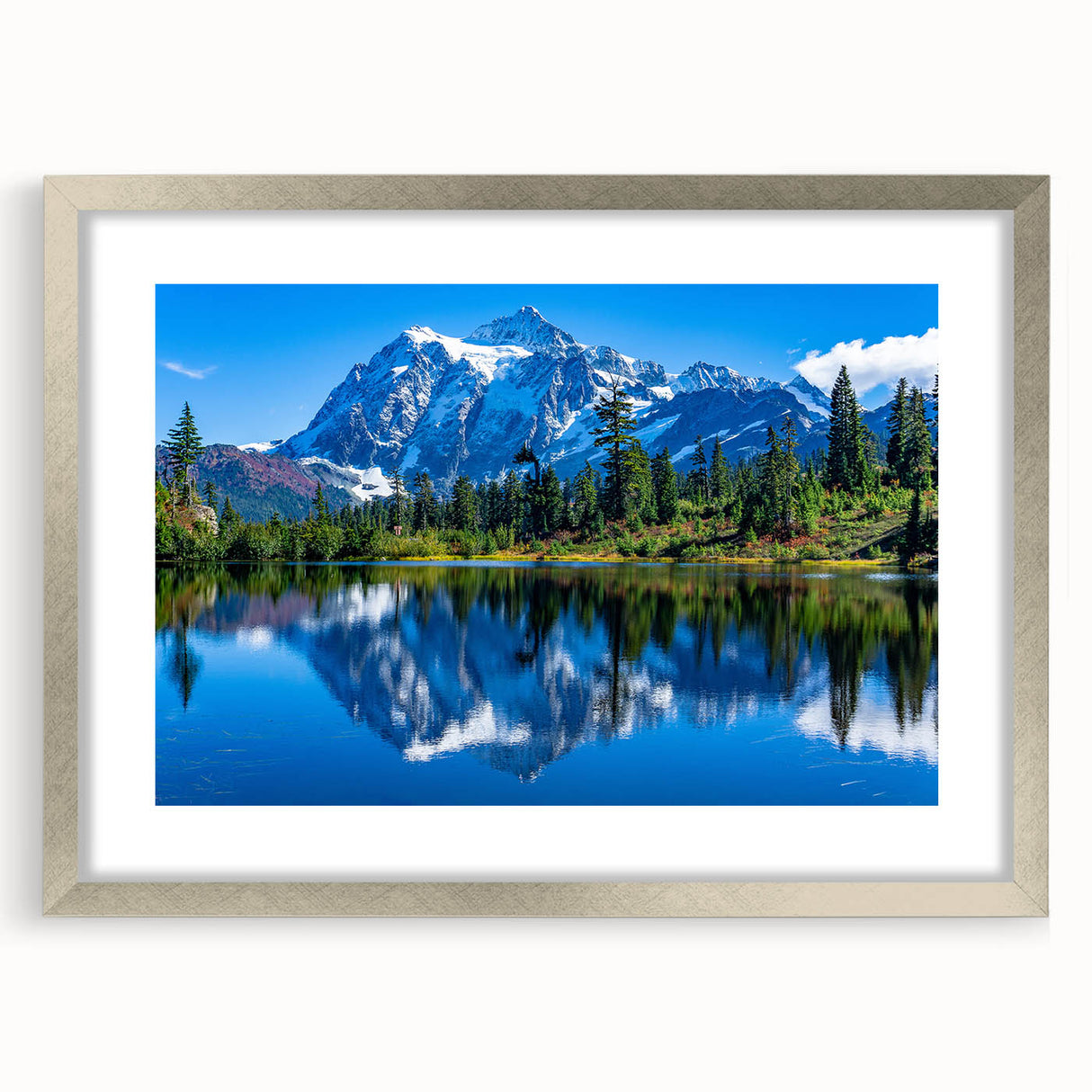 Textured art of the Rocky Mountains in abstract style, featuring muted earth tones on a framed silver mat.