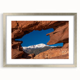 Textured abstract art print of Colorado Springs in earth tones, framed with a silver mat, suitable for bedroom decor.