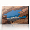 Large abstract wall art depicting Colorado Springs scenery in muted earth tones on a black framed acrylic print.