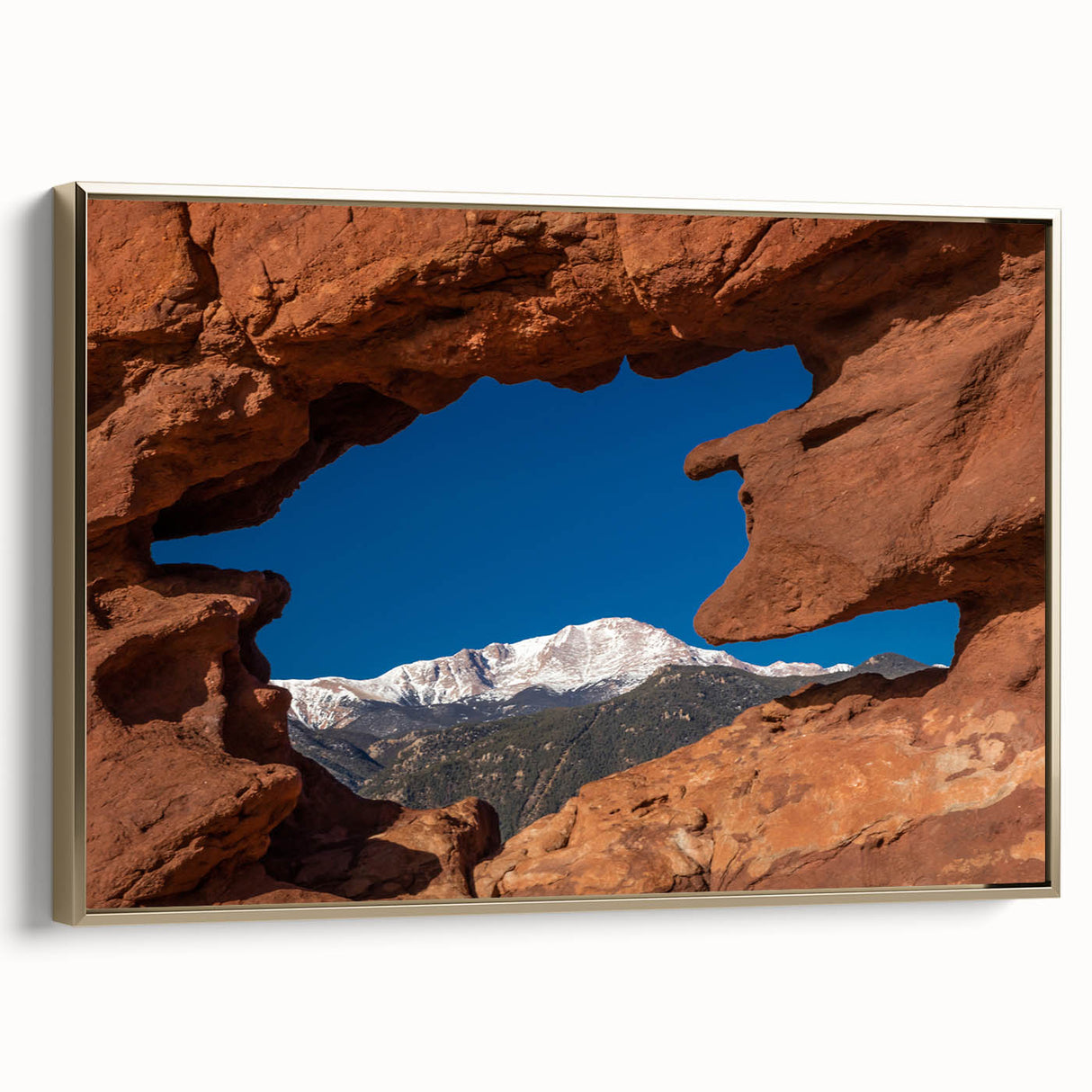Framed canvas depicting a vintage-style landscape of Colorado Springs with muted earth tones, ideal for bedroom wall art.