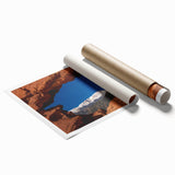 Extra large rolled print of Colorado Springs scenery with floral accents in soft green and pink tones.