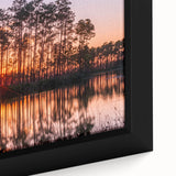 Close-up of a textured black wall art depicting the Everglades with vibrant colors on a framed canvas.