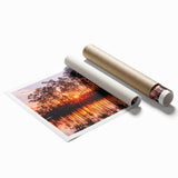 Rolled print of the Everglades with lush greenery and water, in muted green and blue tones.