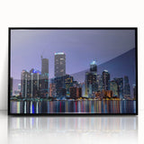 Large abstract wall art featuring vibrant Miami skyline in acrylic, framed in black, ideal for modern living room decor.