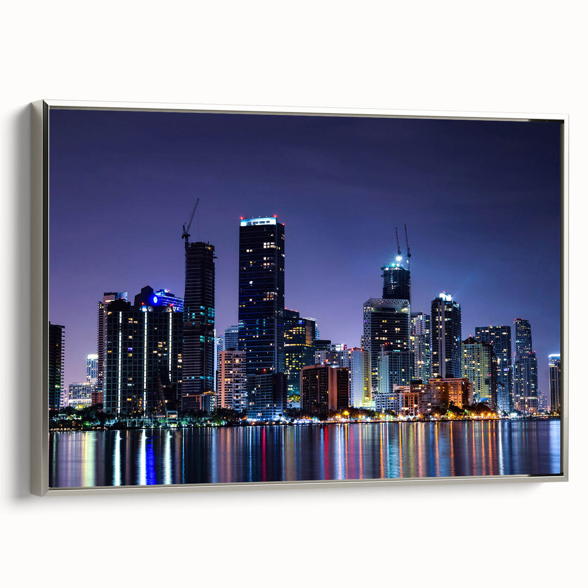 Framed canvas depicting a vintage-style Miami landscape with colorful art elements.