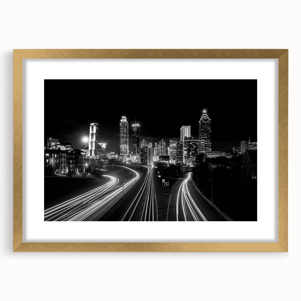 Extra large wall art featuring an abstract Atlanta skyline in textured hues of gold and blue on a framed canvas.