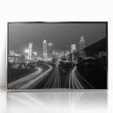 Mid-century modernist art depicting the Atlanta skyline in muted gray and blue tones on a framed acrylic print.