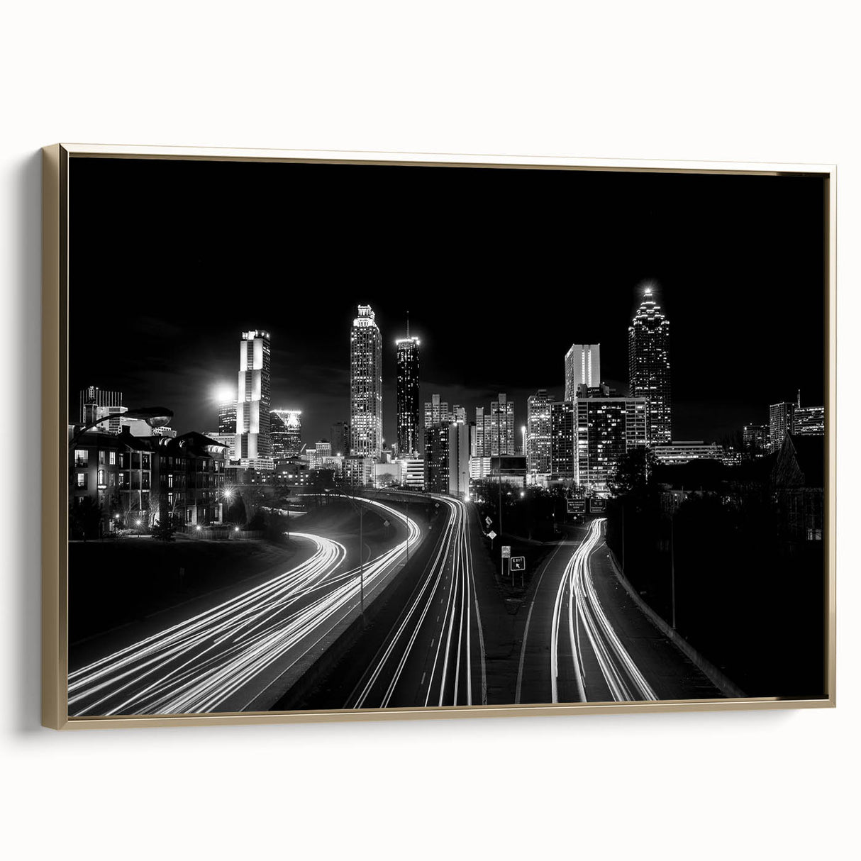 Framed canvas wall art featuring a vintage-style Atlanta skyline in muted gold and black tones, ideal for bedroom decor.