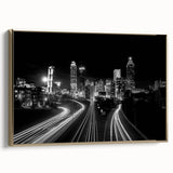 Framed canvas wall art featuring a vintage-style Atlanta skyline in muted gold and black tones, ideal for bedroom decor.