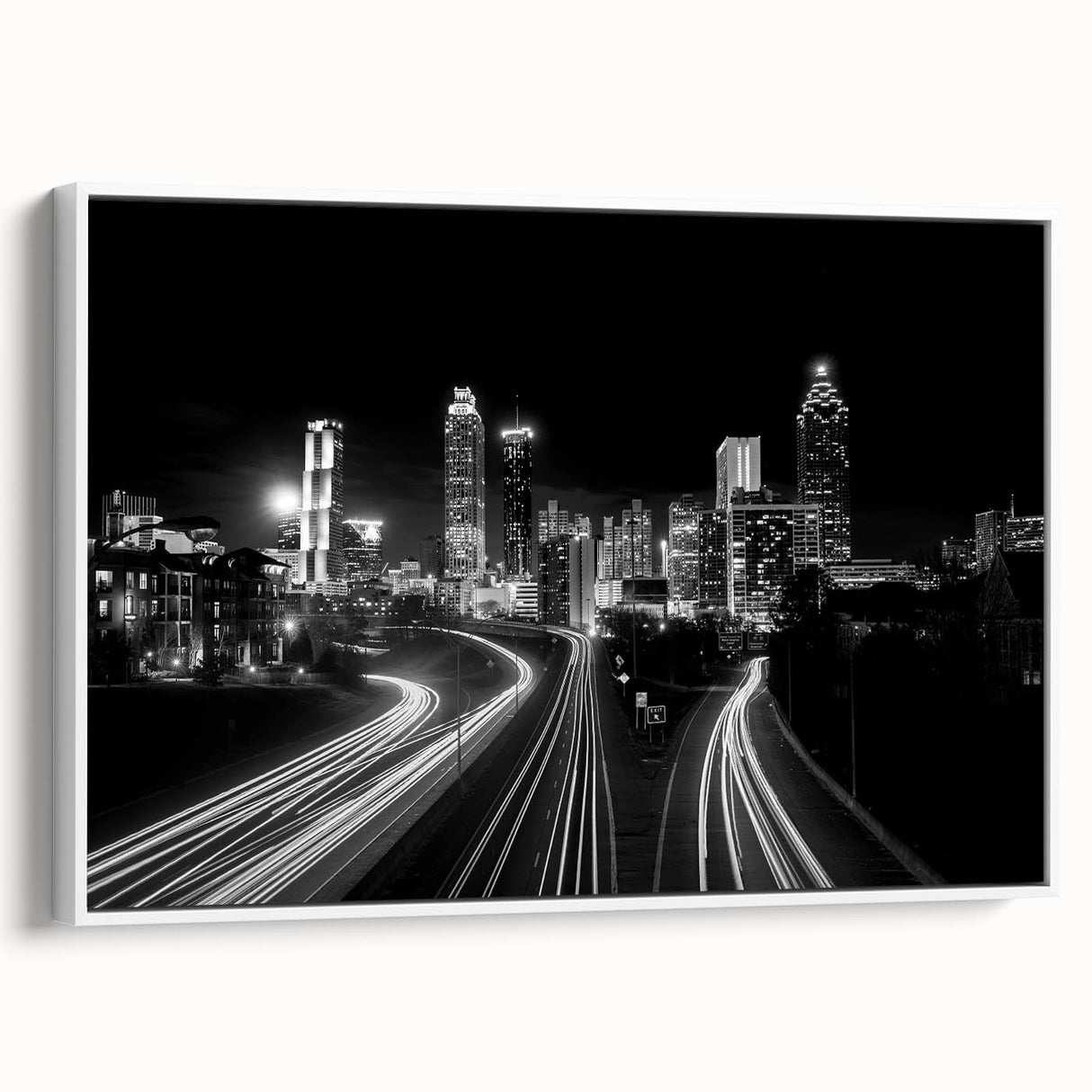 Vintage poster art of Atlanta skyline in vibrant colors on a framed canvas, ideal for living room decor.