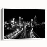 Vintage poster art of Atlanta skyline in vibrant colors on a framed canvas, ideal for living room decor.