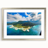 Textured art depicting Kauai's lush landscape in muted green and blue tones on a framed silver mat.
