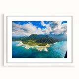 Abstract art print of Kauai landscape in muted green and blue tones, framed with a white mat, suitable for dining room decor.