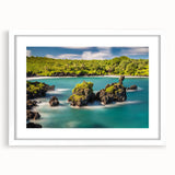 Abstract art print of a Maui landscape in muted blue and green tones on a framed white mat, ideal for dining room decor.