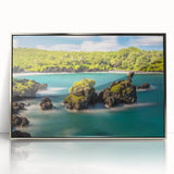 Mid-century modernist art depicting a serene Maui landscape in pastel shades, framed in silver acrylic.