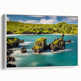 Vintage poster art of a Hawaiian landscape on a framed canvas, featuring vibrant colors against a black background.