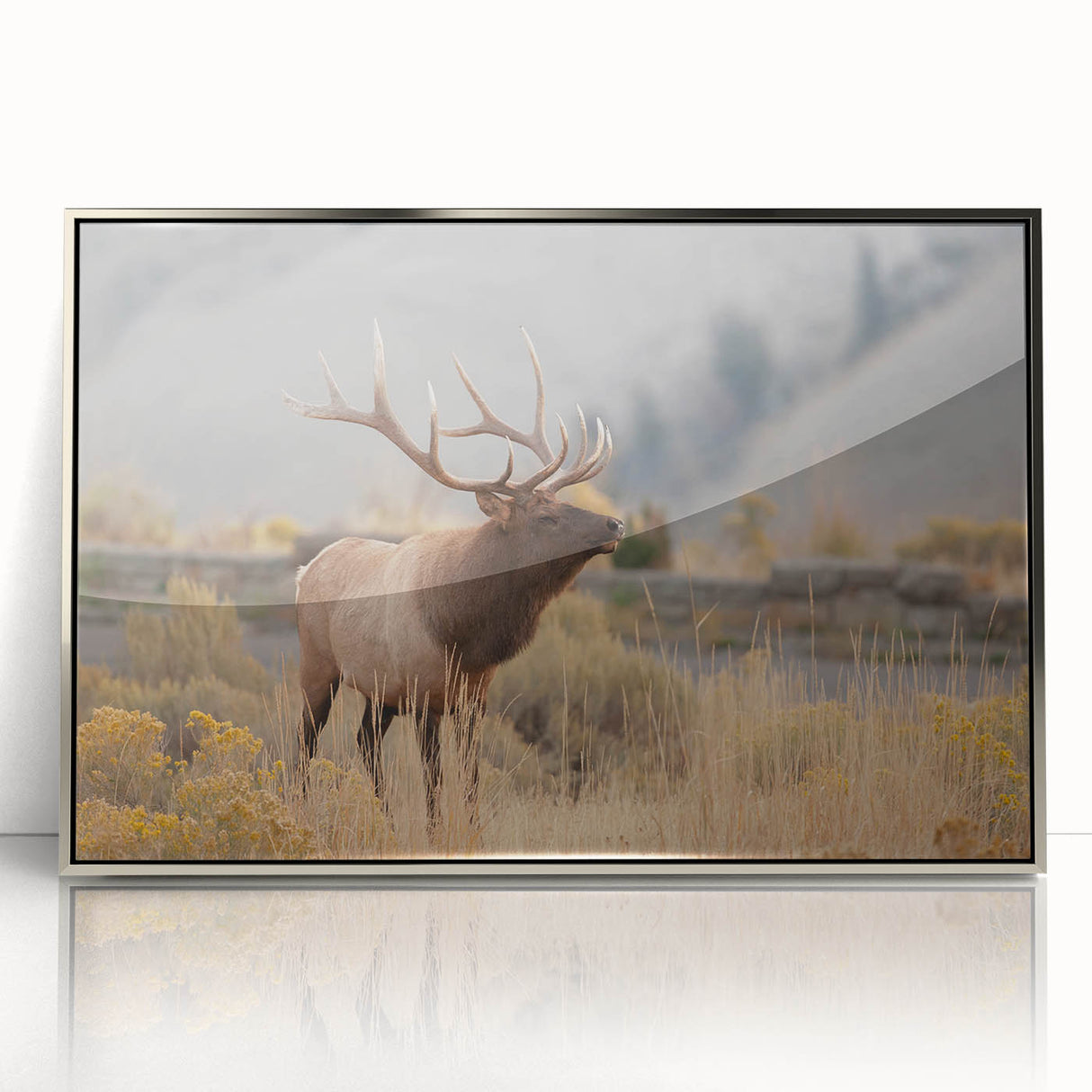Mid-century modernist Idaho scenery on a silver-framed acrylic print, featuring muted earth tones.