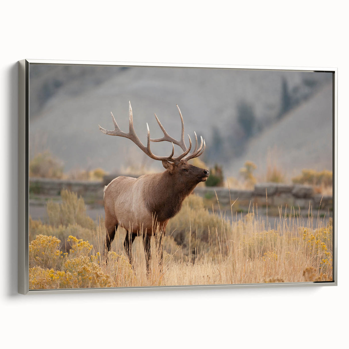 Landscape art painting of Idaho scenery on a framed canvas, featuring muted earth tones and a vintage poster style.