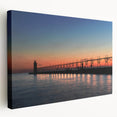 Panoramic view of Lake Michigan at sunset, with muted blue and orange tones on stretched canvas.