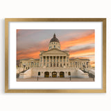 Extra large abstract art print of Kansas scenery in muted earth tones on a textured canvas, framed in gold.