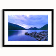 Colorful abstract art print of Acadia, Maine, in a black frame with mat, ideal for living room decor.
