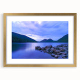 Abstract art print of Acadia's rugged coastline in textured shades of blue and gray on a large framed canvas.