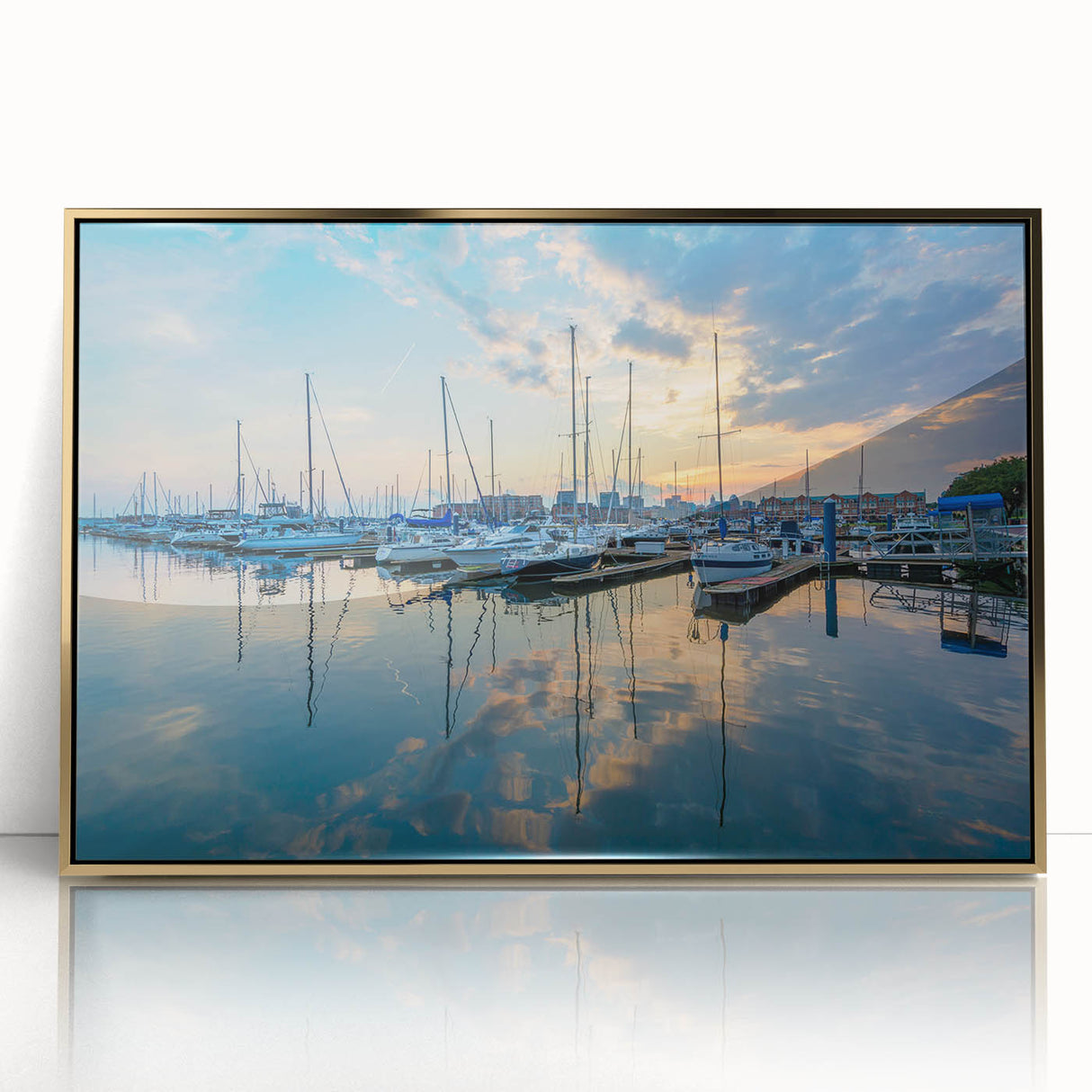 Acrylic print of Baltimore skyline in gold and black hues, framed in mid-century modernist style.