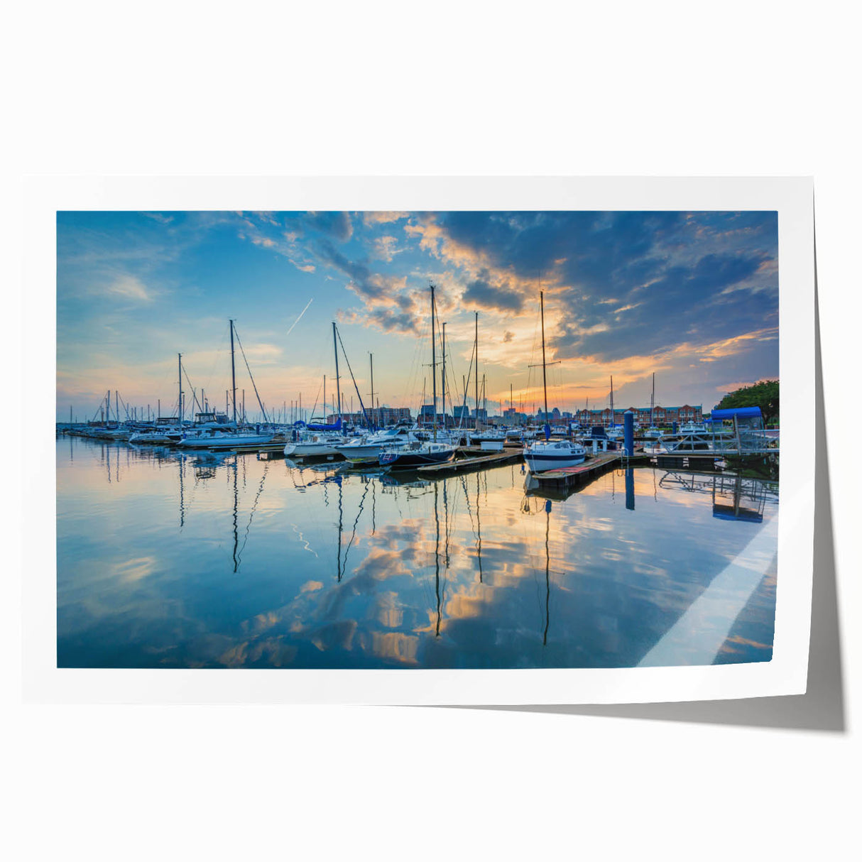 Rolled print of Baltimore skyline featuring muted blue and gray tones.