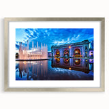 Textured art print of Kansas City skyline in muted gray tones on a framed silver mat, suitable for bedroom decor.