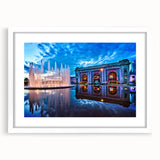 Abstract art print of Kansas City skyline in muted gray and blue tones on a white framed canvas.