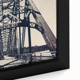 Black wall art of St. Louis skyline in vibrant colors on a textured, framed canvas, ideal for living room decor.