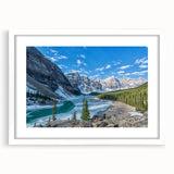 Abstract art print of Glacier National Park in muted blue and green tones on a white framed canvas.