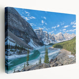 A scenic depiction of Montana's Glacier National Park on stretched canvas, using earthy green and blue tones.