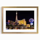Extra large abstract art print of Las Vegas skyline in vibrant gold and black tones on a framed canvas.