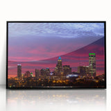 Large abstract wall art depicting Charlotte skyline in muted gray and blue tones on framed acrylic.