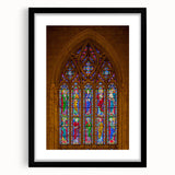 Abstract art print of Durham cityscape in vibrant colors on a large canvas, framed in black, suitable for living room decor.