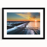 Colorful abstract art print of Outer Banks scenery in vibrant hues on a large framed canvas, ideal for living room decor.