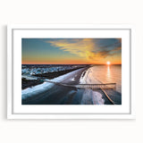 Abstract art print of the Outer Banks in muted blue and gray tones on a framed canvas.