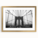 Extra large abstract art print of Brooklyn Bridge in textured hues of gray and blue on a gold-framed canvas.