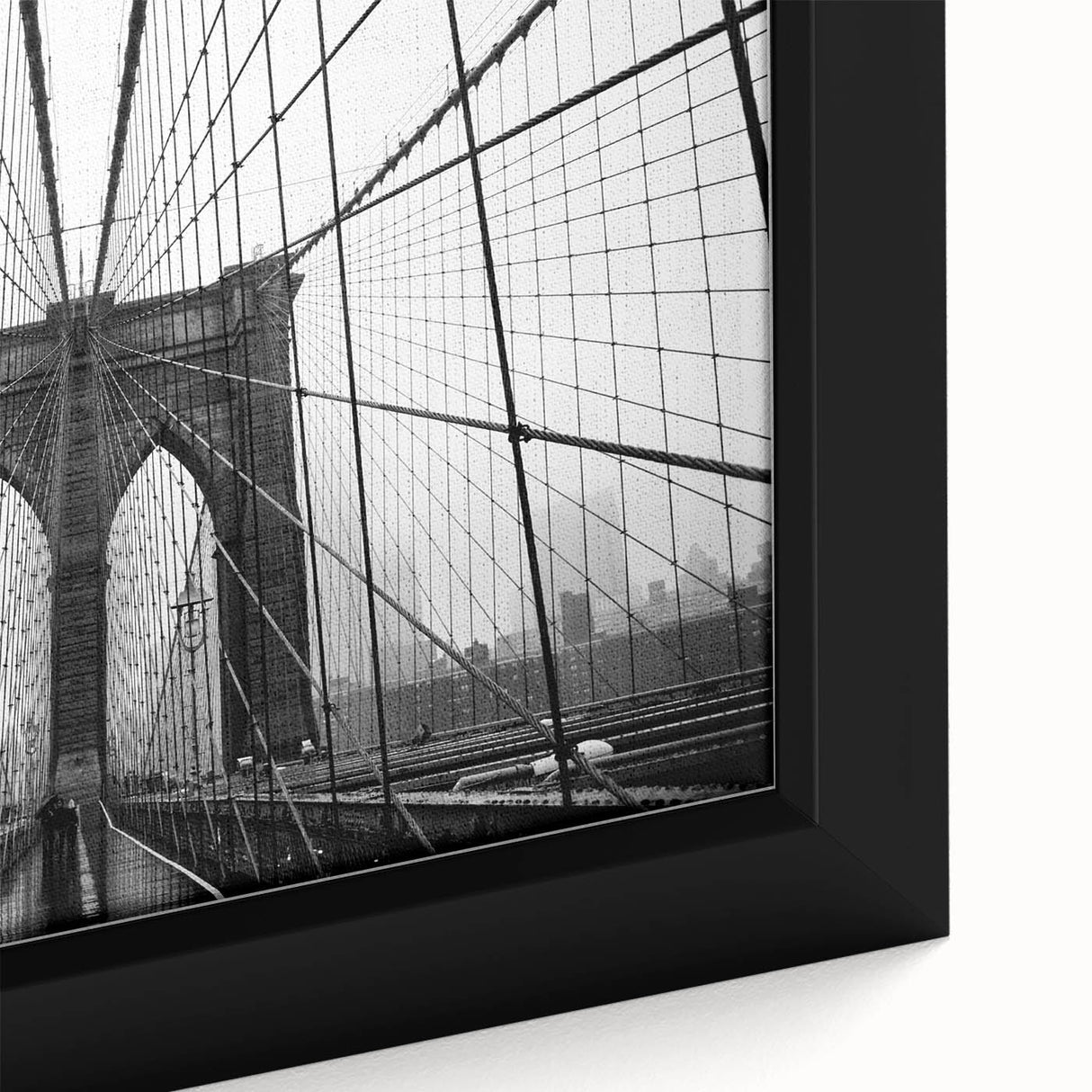 Extra large framed canvas of the Brooklyn Bridge in black with vibrant, textured color accents, ideal for living room decor.