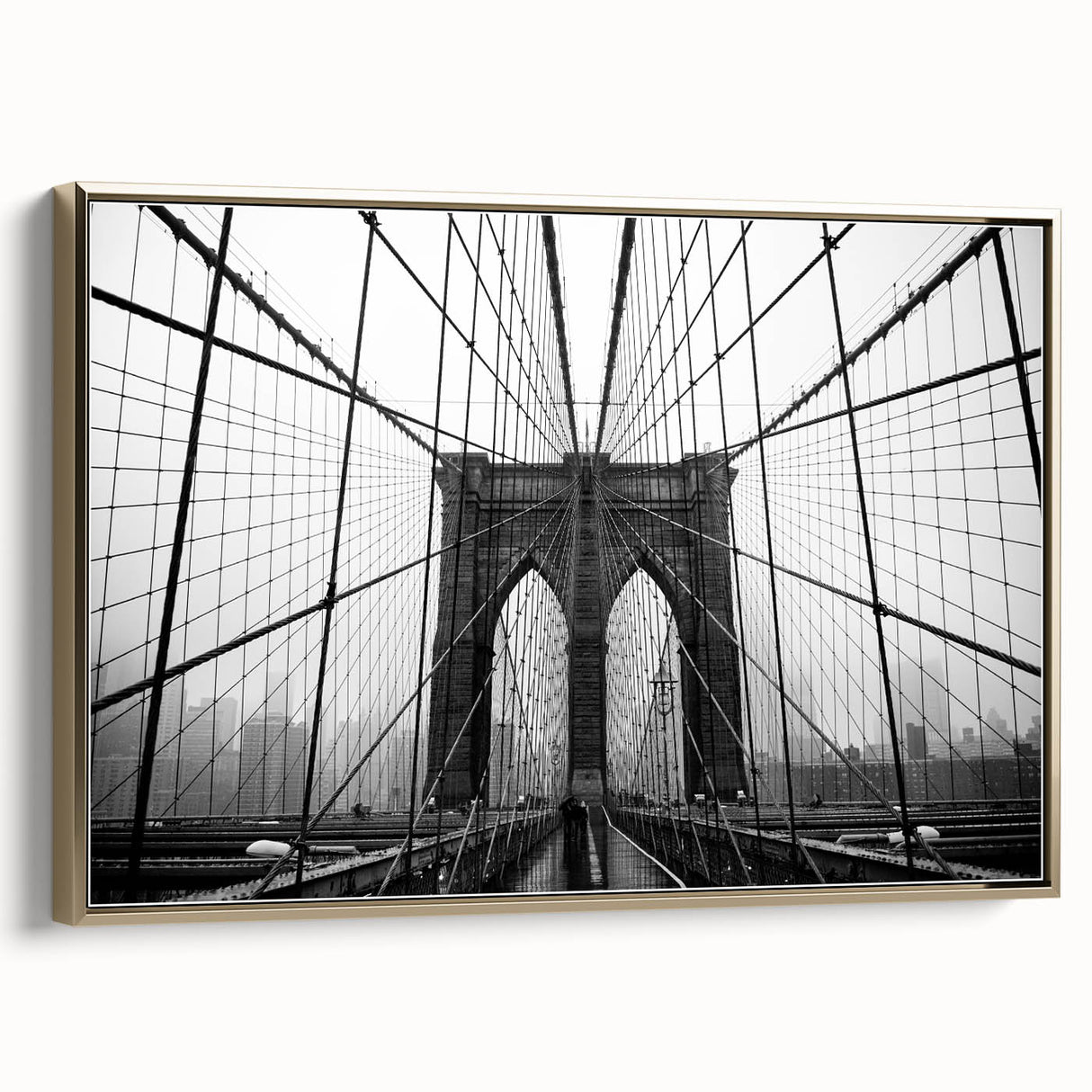 Framed canvas of the Brooklyn Bridge in black and gold tones, ideal for bedroom wall art.