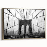 Framed canvas of the Brooklyn Bridge in black and gold tones, ideal for bedroom wall art.