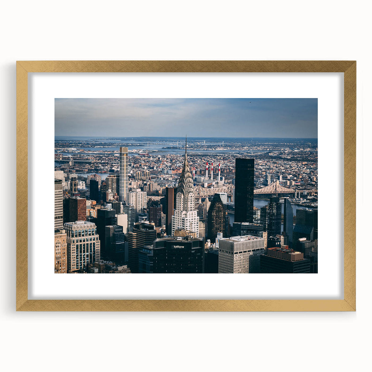 Extra large abstract art print of the Chrysler Building in textured gold and black tones on a framed canvas.