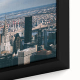 Close-up of a black wall art canvas featuring a textured depiction of the Chrysler Building in vibrant colors.