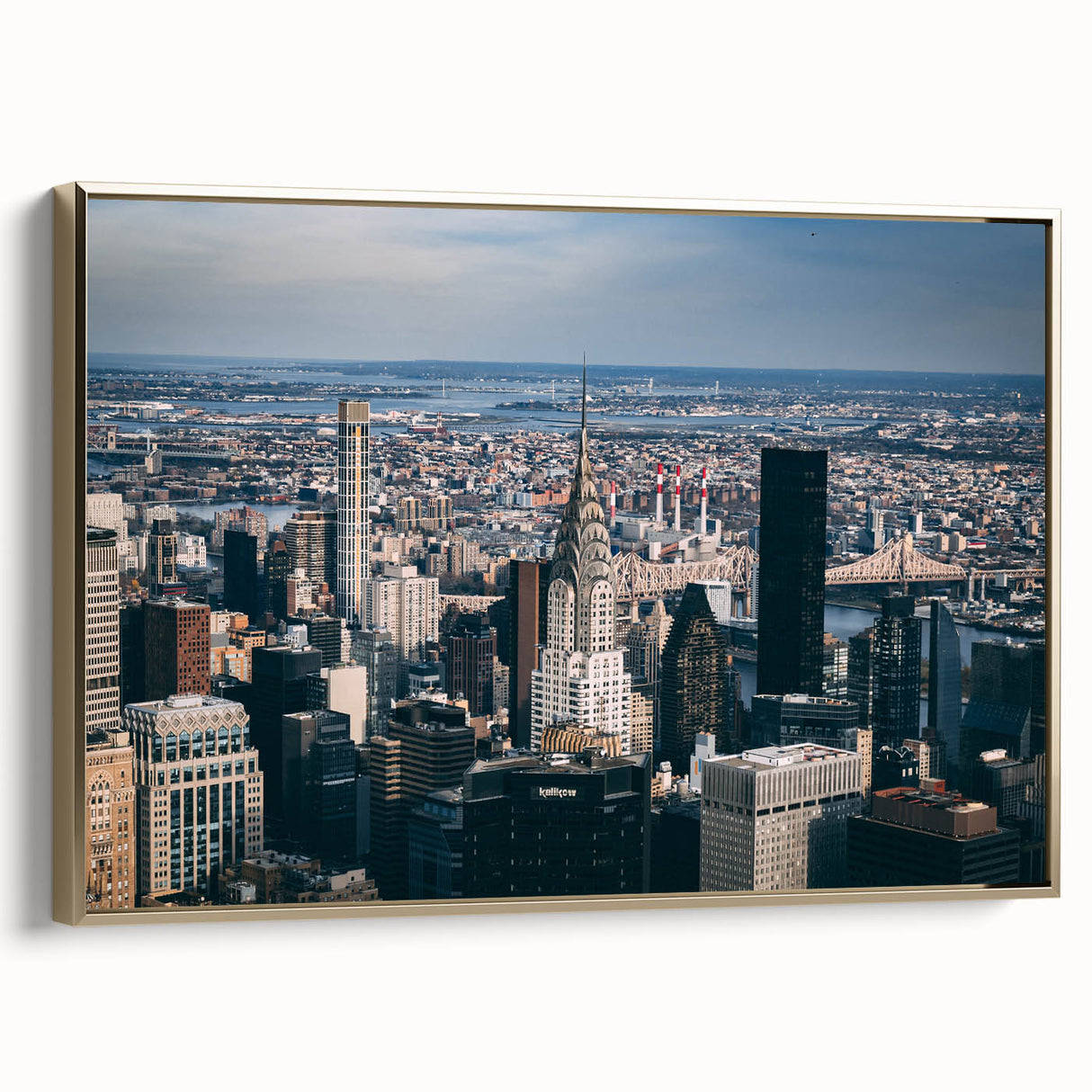 Side view of the Chrysler Building in gold and black tones on a framed canvas, suitable as wall art for a bedroom.