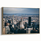 Side view of the Chrysler Building in gold and black tones on a framed canvas, suitable as wall art for a bedroom.