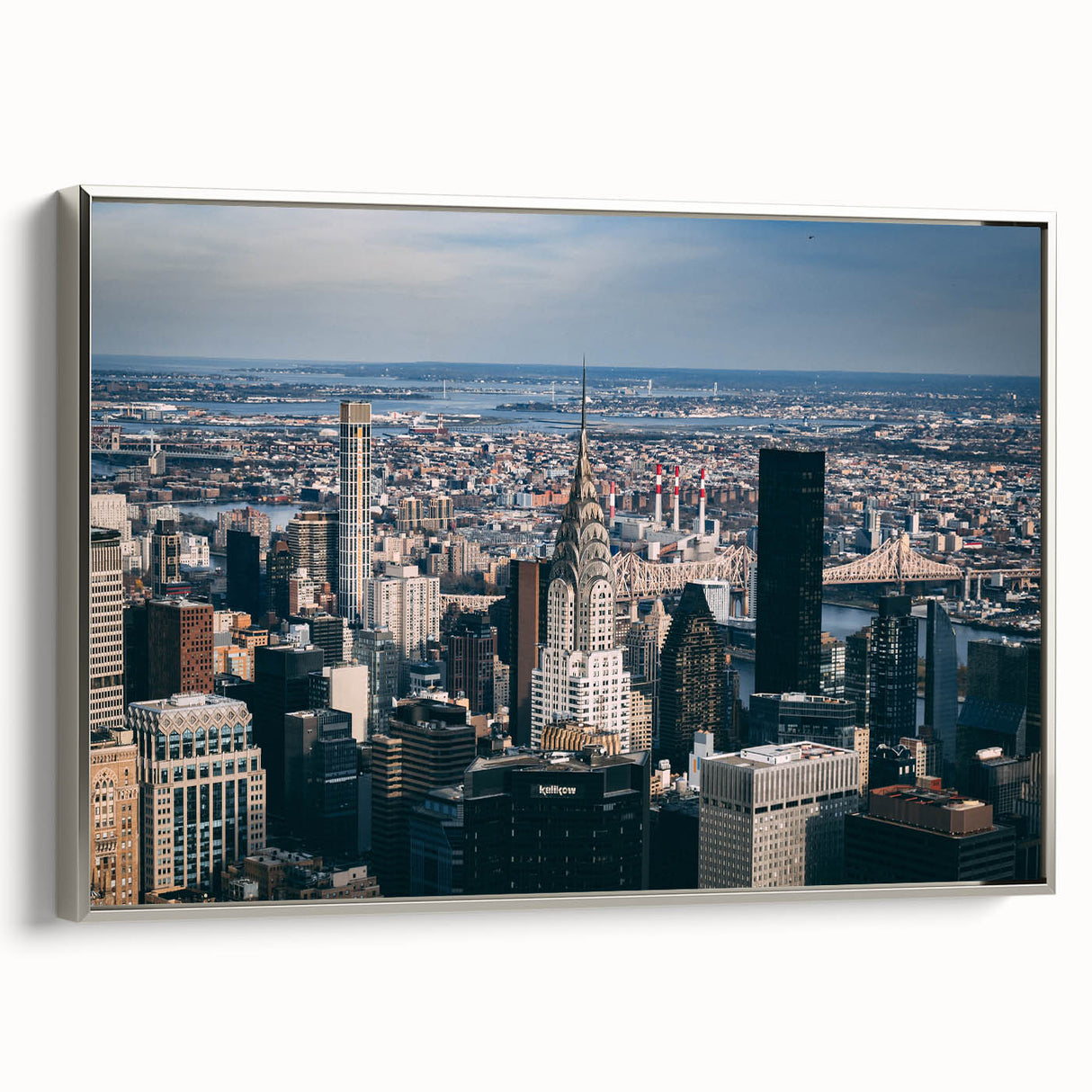Framed canvas of the Chrysler Building in grayscale with vibrant colorful backdrop, ideal for office decor.