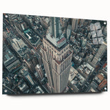 Acrylic print of the New York City skyline at dusk, featuring large abstract shapes in blue and gray.