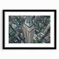 Extra large, textured abstract art print of colorful New York City skyline on a framed black mat.